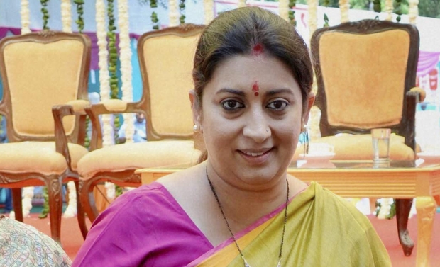 A file photo of Union HRD Minister Smriti Irani (Photo: PTI)
The saris were distributed today by Ms Irani's aide Vijay Gupta A file photo of Union HRD Minister Smriti Irani (Photo: PTI)
The saris were distributed today by Ms Irani's aide Vijay Gupta
